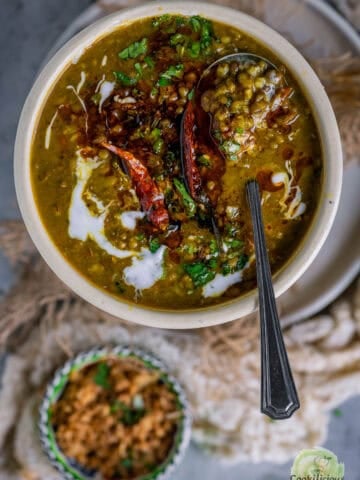 A small bowl filled with Green Gram Curry.