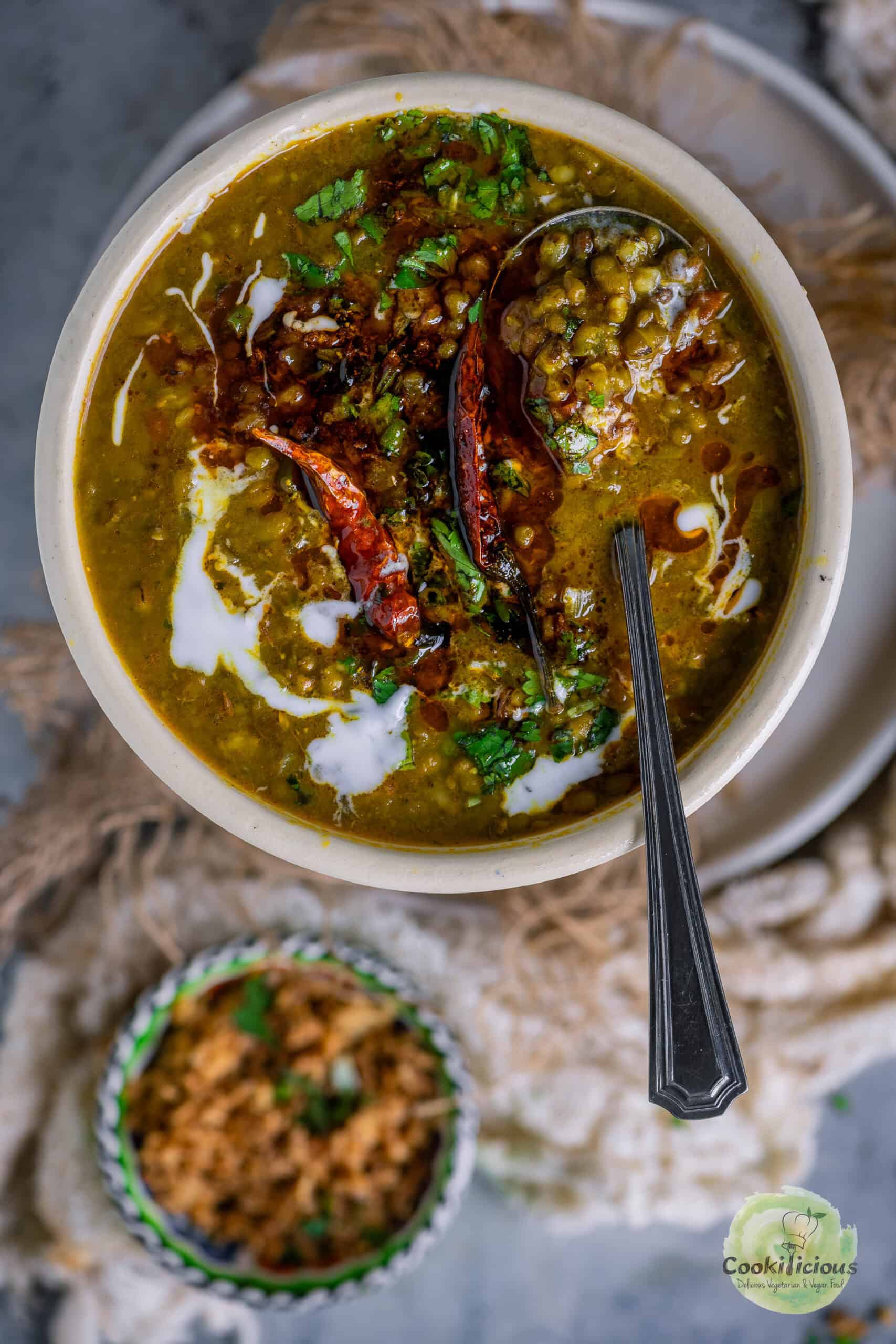 A small bowl filled with Green Gram Curry.