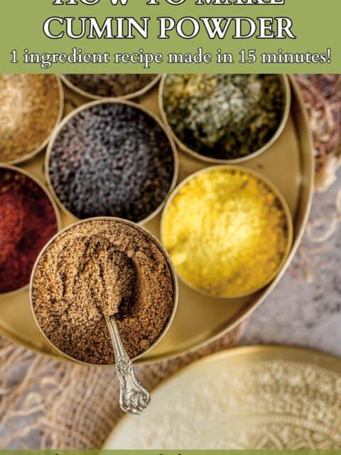 Cumin powder stored in an Indian masala dabba along with other spice blends and text at the top and bottom.