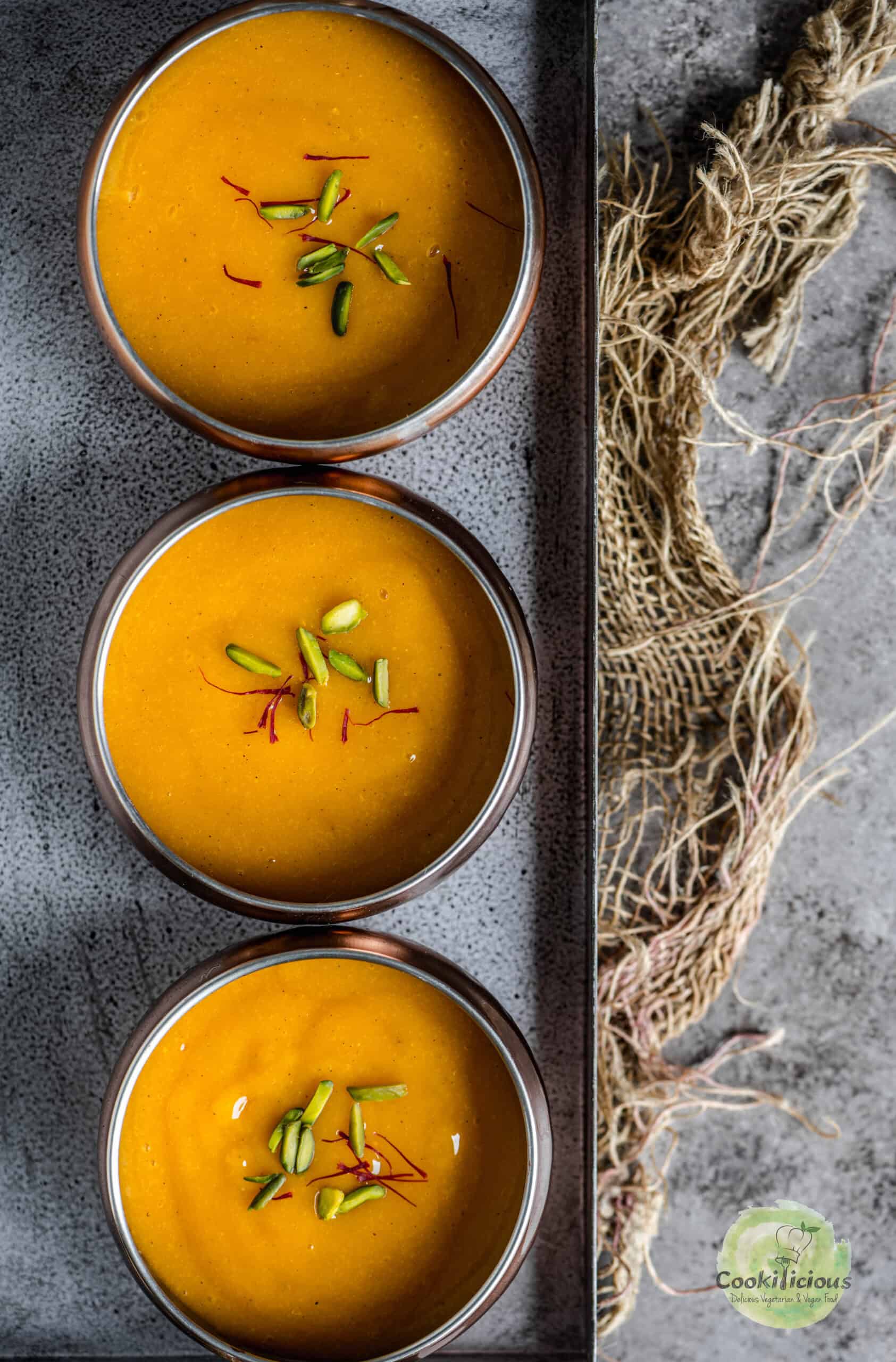3 bowls of sweet mango pulp served in a tray.