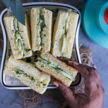 Classic English tea-time cucumber and cream cheese sandwiches with crusts removed.