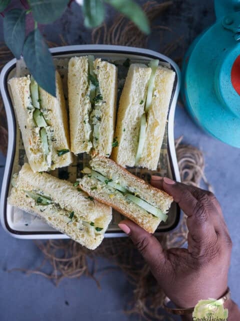 Classic English tea-time cucumber and cream cheese sandwiches with crusts removed.