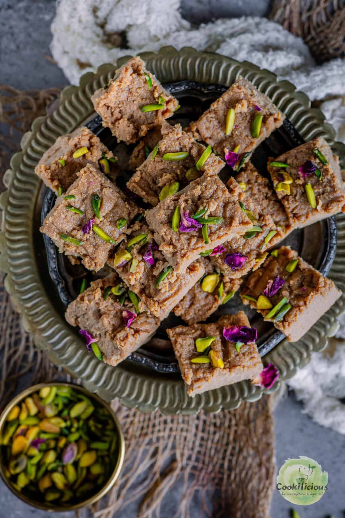 Fudgy Caramel Kalakand barfi pieces chilled and cut into squares.