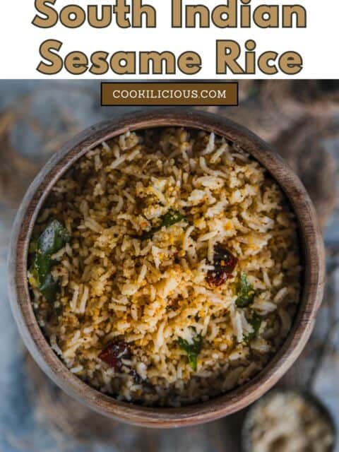 Close-up of steaming hot Sesame Rice (Ellu Sadam) garnished with fresh curry leaves and mustard seeds and text at the top.