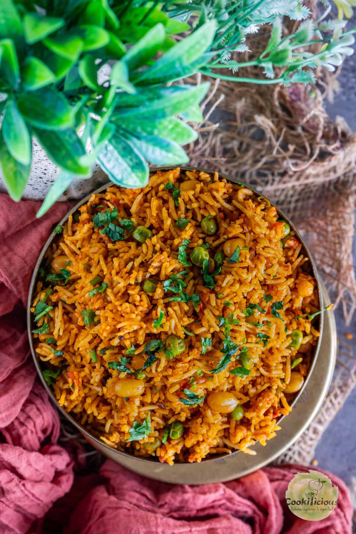 Vegan tomato rice recipe made with leftover rice, tomatoes, and spices.
