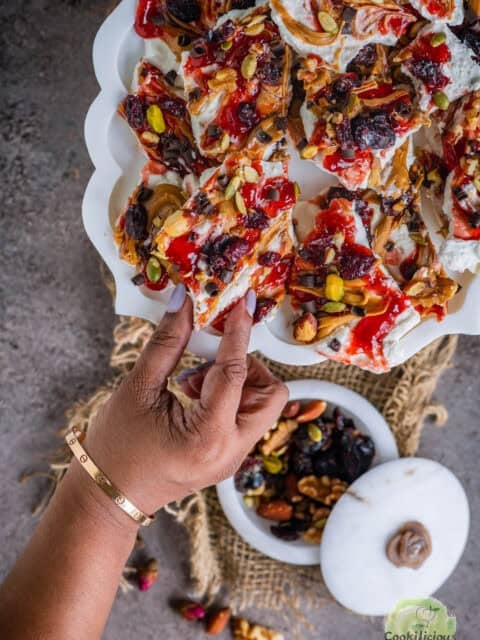 Healthy frozen cottage cheese bark broken into bite-sized pieces, perfect for festive snacking.