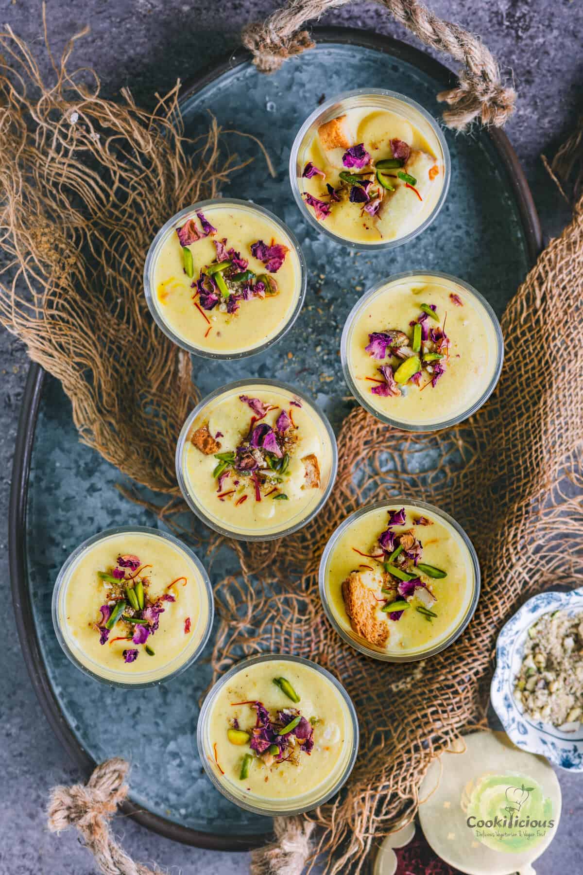 Festive table setup featuring Rabdi Cheesecake served as a showstopper Indian dessert for Diwali celebration.