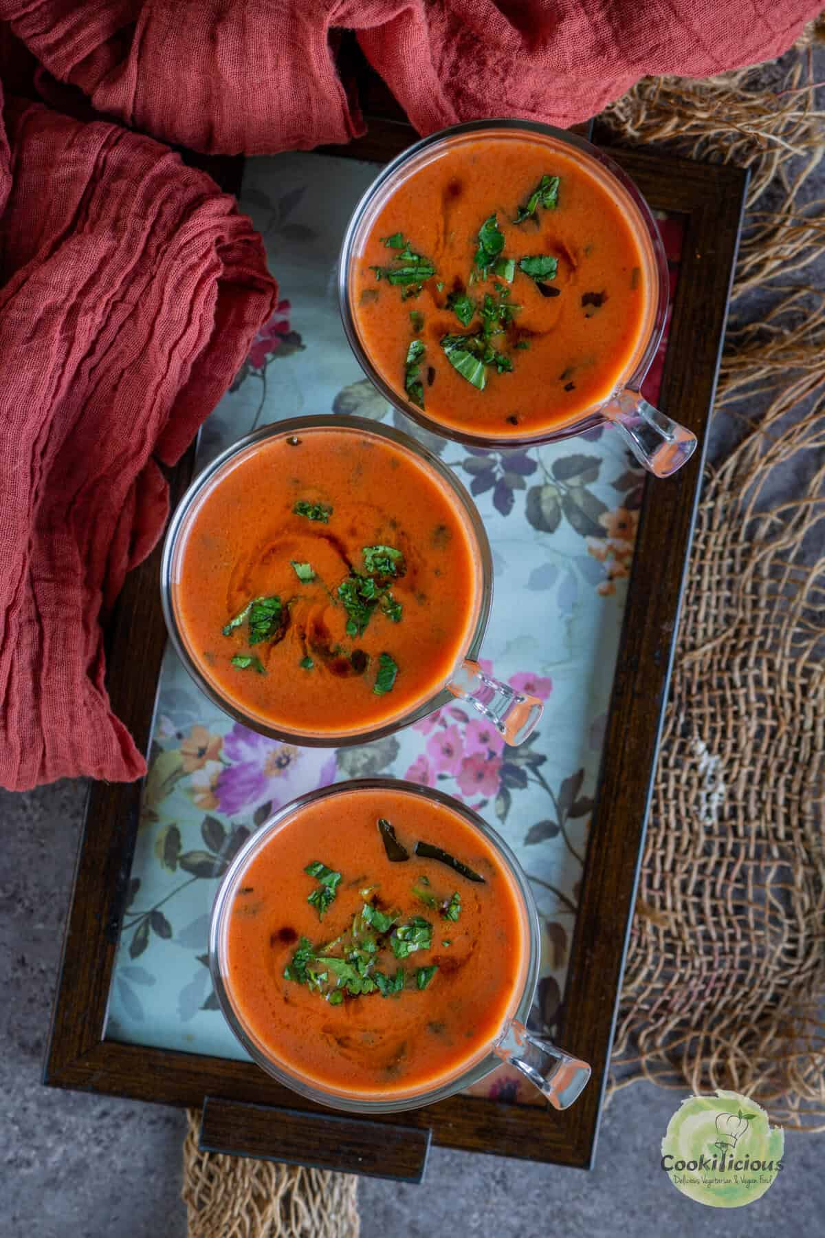 Tomato Saar served in shot glasses – savory Indian tomato drink made with coconut milk and spices.