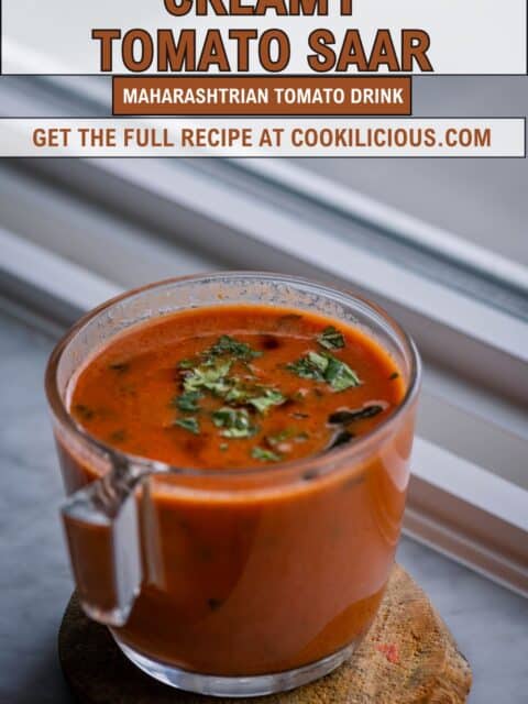 Maharashtrian Tomato Saar – tangy tomato coconut soup served warm with fresh cilantro and text at the top and bottom.