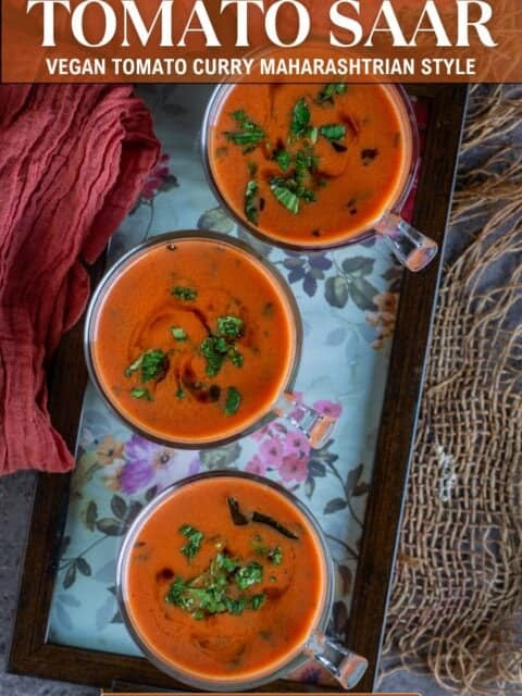 Vegan Tomato Saar poured into shot glasses – perfect savory drink for festive gatherings and text at the top and bottom.