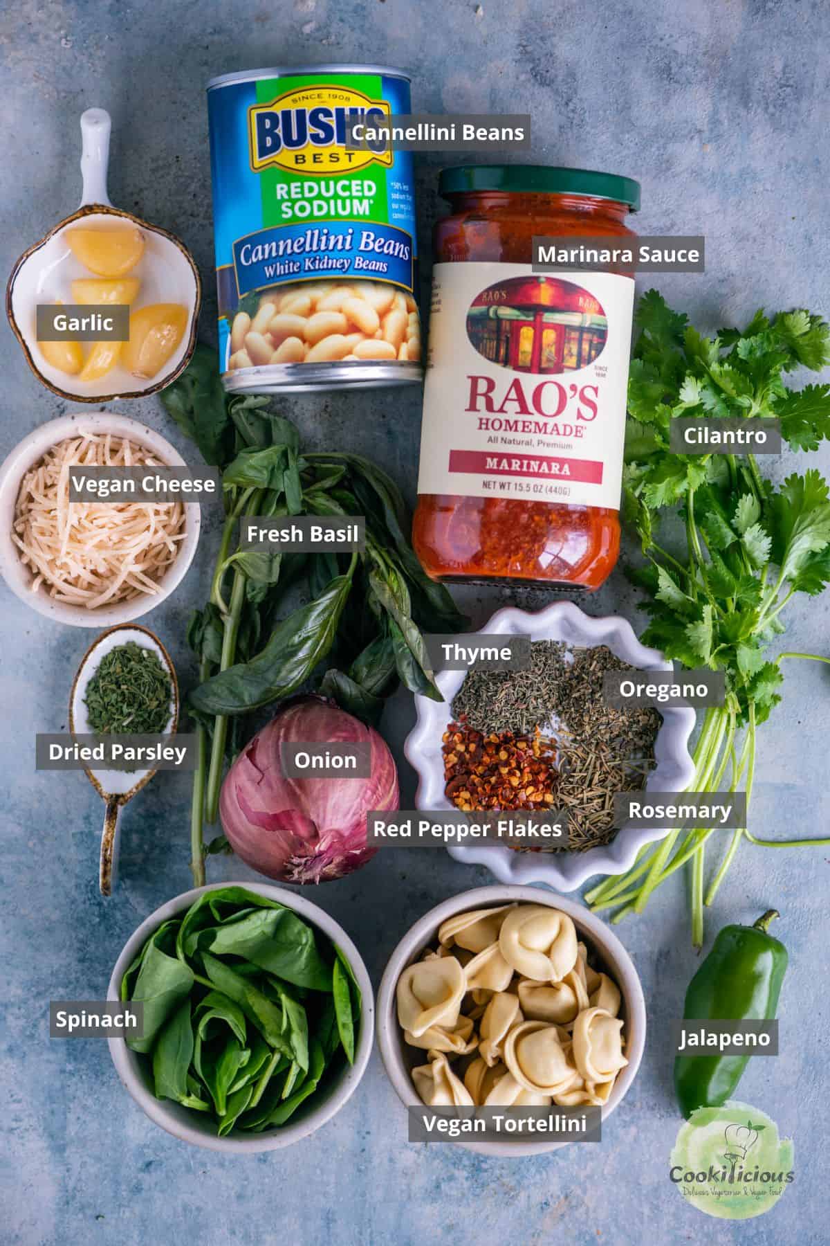 all the ingredients needed to make vegan tortellini soup in the Instant Pot and labels on them.