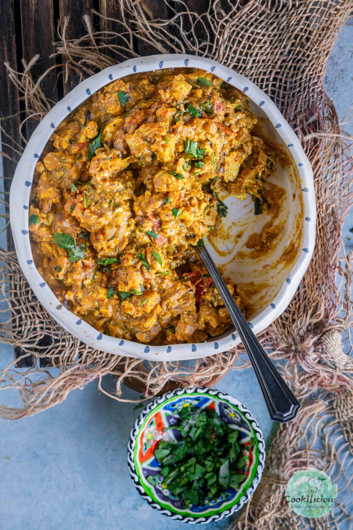 Protein-rich scrambled paneer bhurji with onions, tomatoes, and aromatic spices.