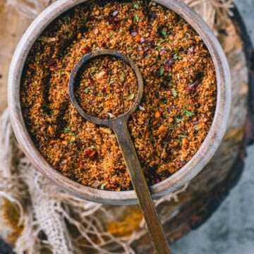 Homemade pangrattato - crispy Italian seasoned breadcrumbs made with stale bread, olive oil, and herbs.