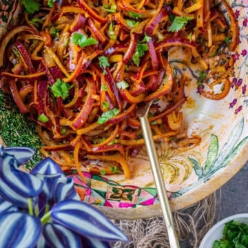 Fresh and crunchy onion salad with Indian spices served in a salad bowl.