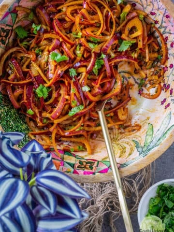 Fresh and crunchy onion salad with Indian spices served in a salad bowl.