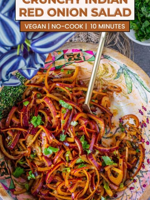 Quick 10-minute Indian onion salad with red onions served in a bowl and text at the top and bottom.
