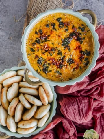 Creamy Paneer Pav Bhaji Dip served in a bowl with mini naan for dipping.