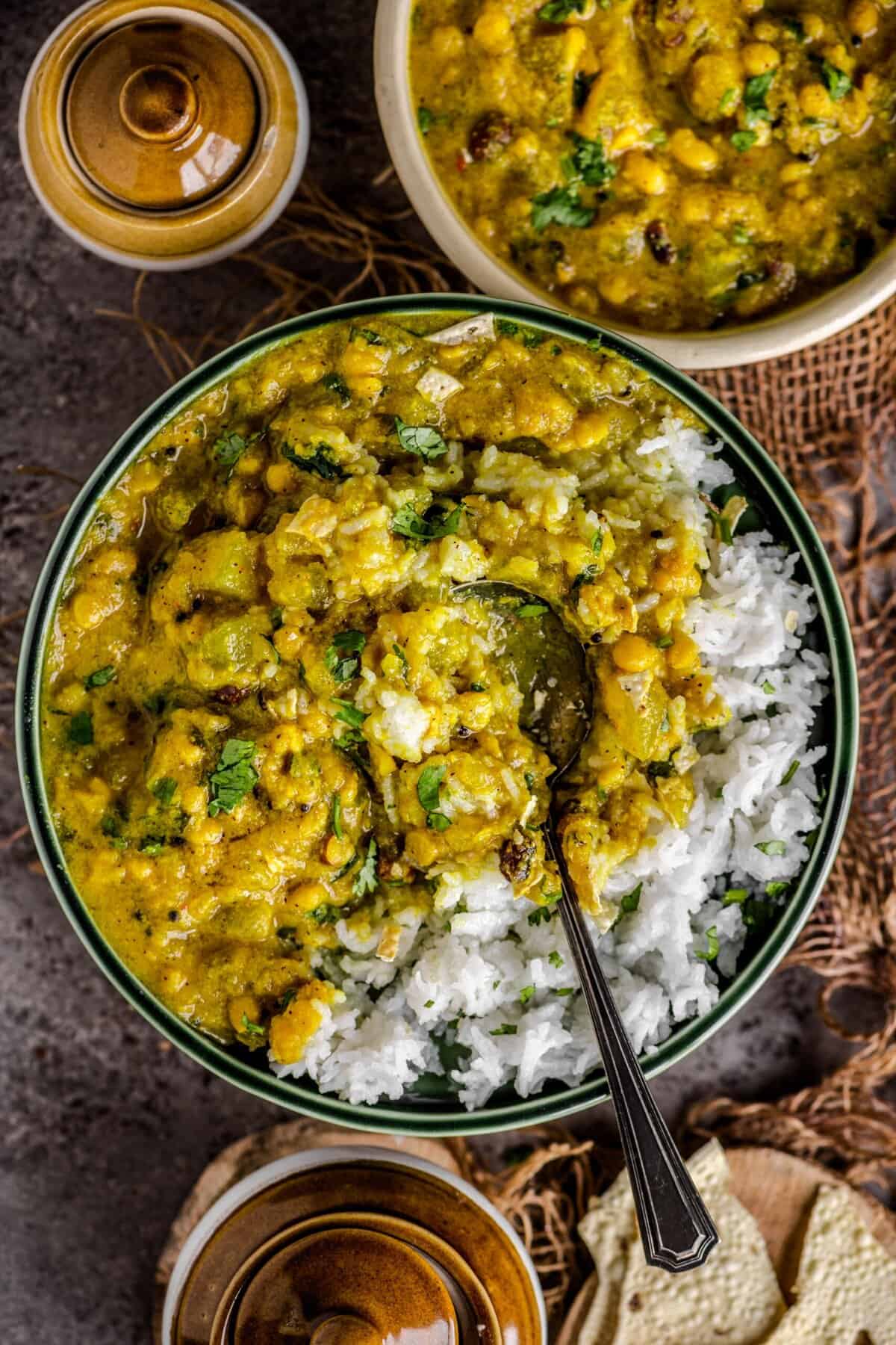 Hearty South Indian white pumpkin kootu served with rice, highlighting the rich coconut masala.