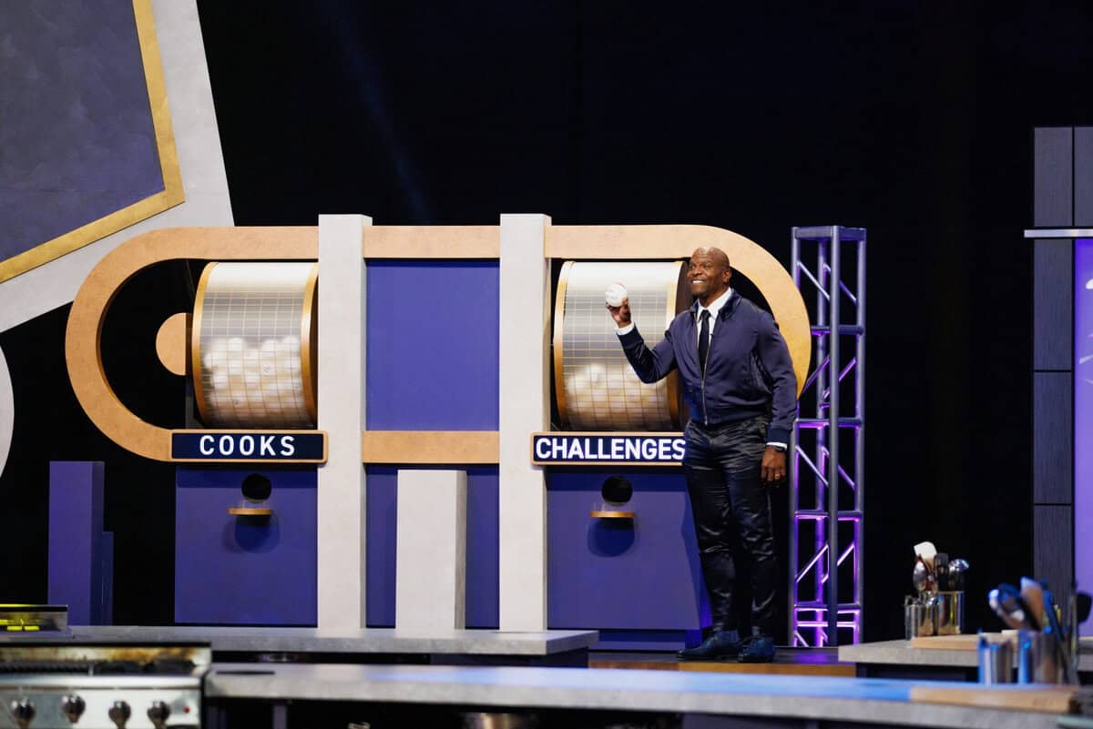 Host Terry Crews announces challenge, as seen on 100 Cooks, Season 1.