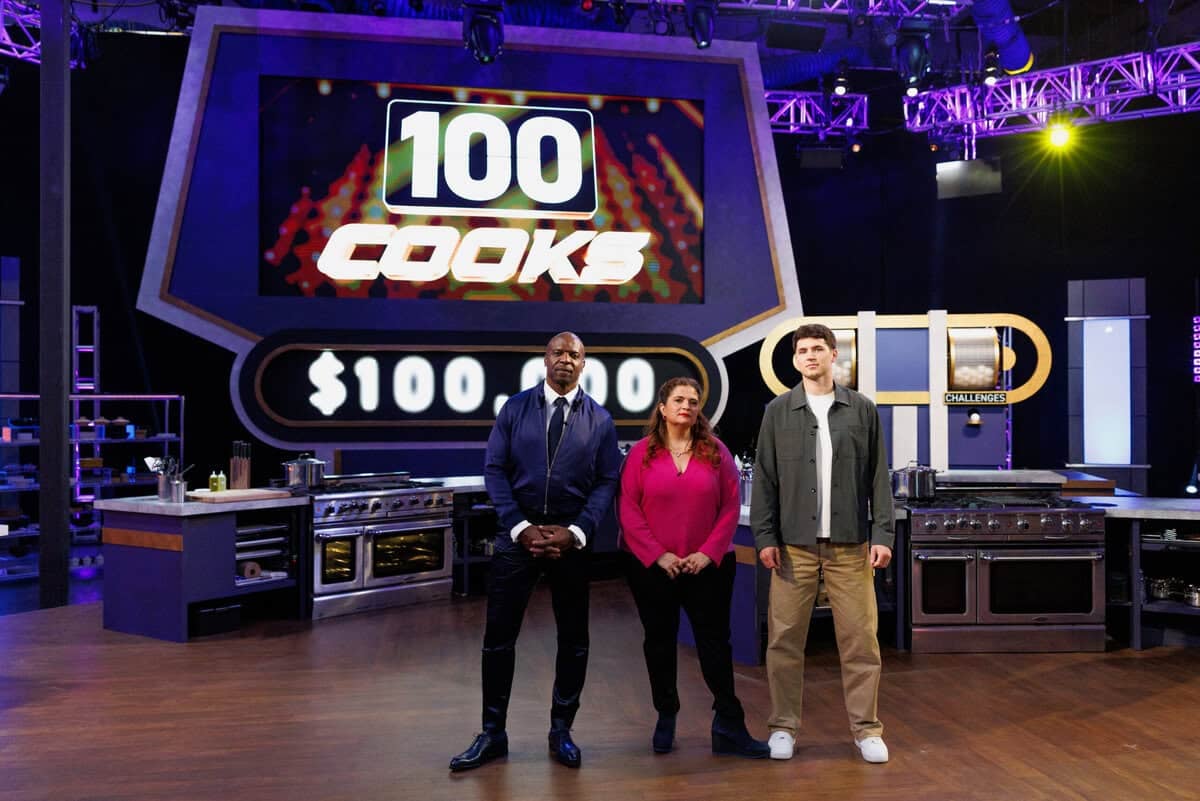 Terry posing with the two judges of 100 Cooks - culinary creator Nick DiGiovanni and celebrity chef Alex Guarnaschelli.